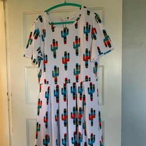 Fun cactus dress with zip up back and pockets!!